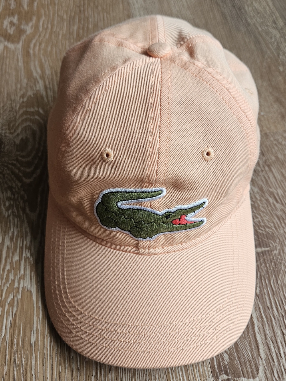 Lacoste Unisex Adjustable Cotton Twill Cap. Color: Light Orange